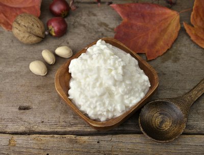 Cottage cheese in wood bowl