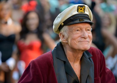 Smiling Hugh Hefner at Playboy mansion