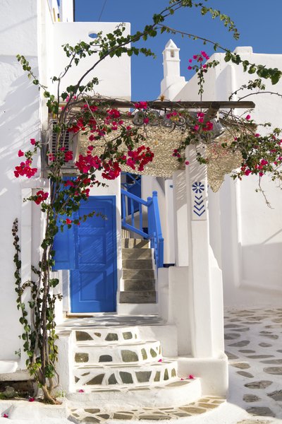 The front entrance of a Greek style home.