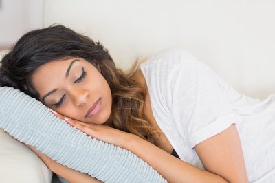 Woman resting on couch