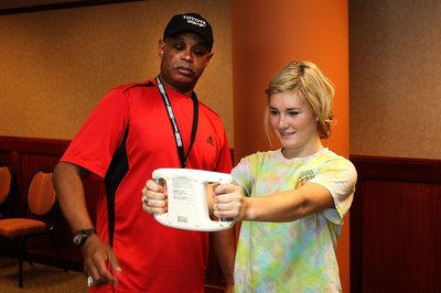 Young woman having her BMI tested