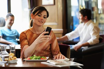 A form of written communication is sending a text message.
