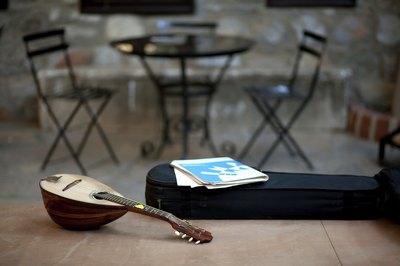 Musical instruments on a stage in a coffeehouse.
