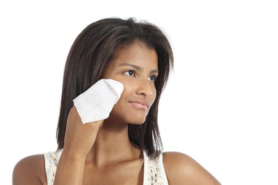 Woman wipes skin