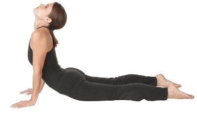Press down through the legs and lift the torso.