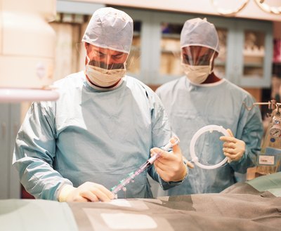 A surgeon places them in a person's ears during outpatient surgery.