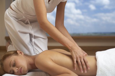 Woman getting a mid back massage
