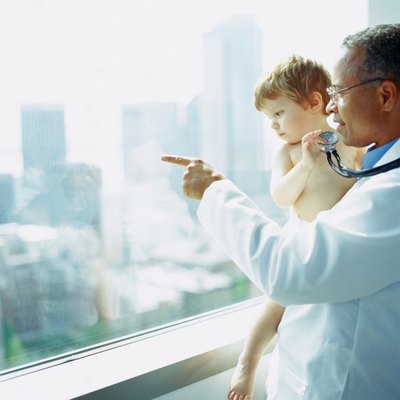 Pediatrician talking with toddler
