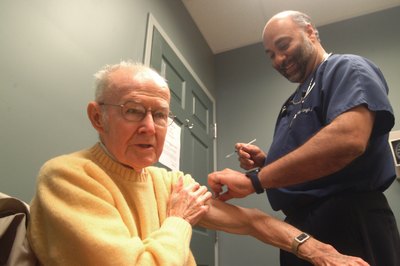 Man receives flu shot from Ft. Erie, Ontario