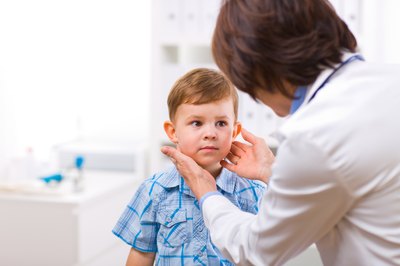 Doctor checking toddler