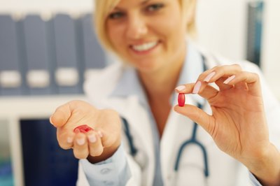 Doctor holds antibiotic