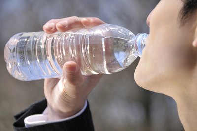 drinking water will dilute stomach acids