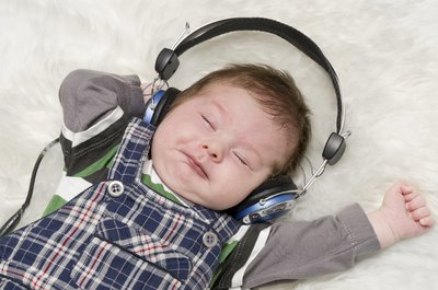 A baby listening to soothing music