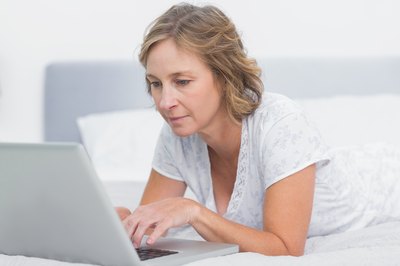 Woman researching about hormone replacement therapy