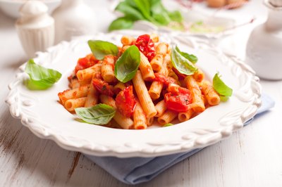 Pasta with tomato sauce and basil.