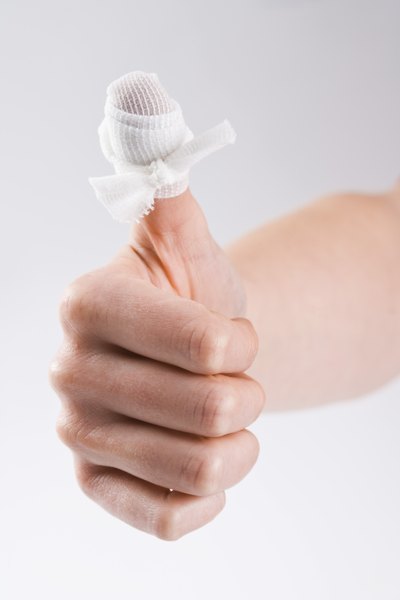 Thumb wrapped in bandage