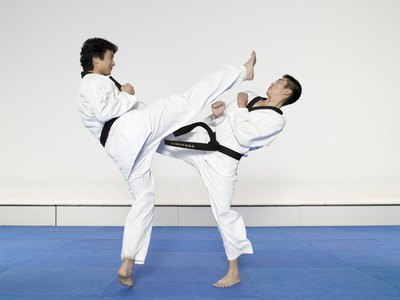 Two men engaging in the martial arts.