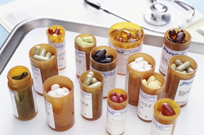 Assortment of supplements on hospital tray.