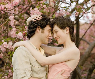 Couple hugging in garden