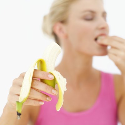 Woman eating a banana