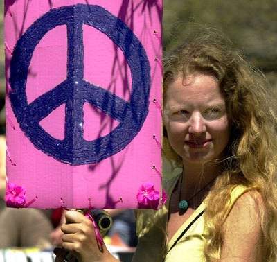 Protestor and peace symbol