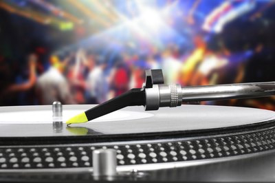 DJ's record playing at party
