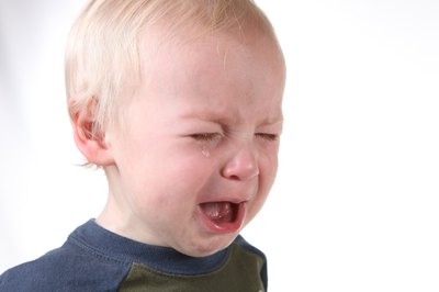 Signs of a fever include crankiness.
