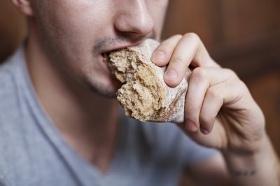 Man eating bread
