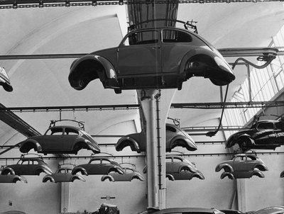 Volkswagen Beetles being manufactured in factory circa 1965