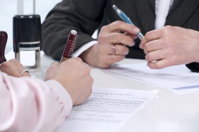 Sign the quitclaim deed.