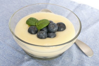 Small bowl of vanilla pudding.