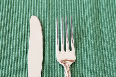 Use a clean knife and fork to scoop butter from the jar