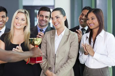 Woman receiving award