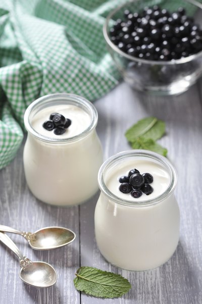 Yogurt topped with fresh blueberries