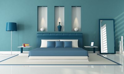 Dark blue painted bedroom