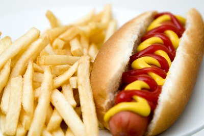 A hot dog with french fries.