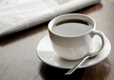 A cup of black coffee.
