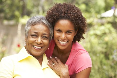 Mom and daugher smiling