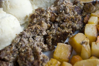 Fried haggis with potatoes.