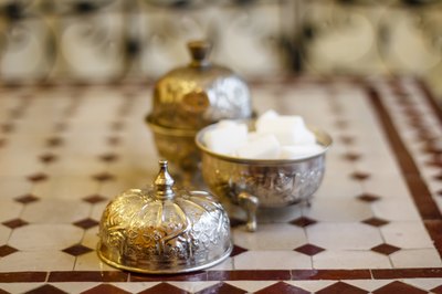 Gold, silver and crystal bowls provide readily available containers for winter wonderland centerpieces