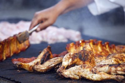 Chicken and meat on barbecue
