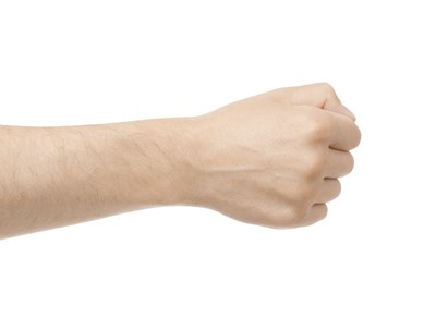 Clench fists.