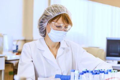 Woman conducting research in laboratory