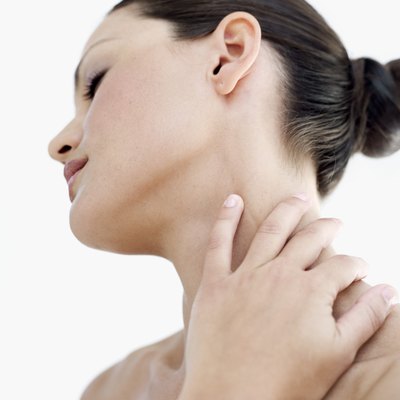 Woman touching her Neck