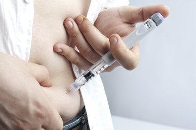 Man injecting insulin