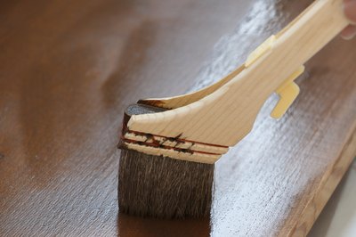 Apply wood stain to the planks if desired.