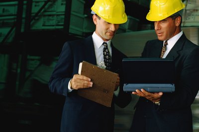 two men discussing safety participation