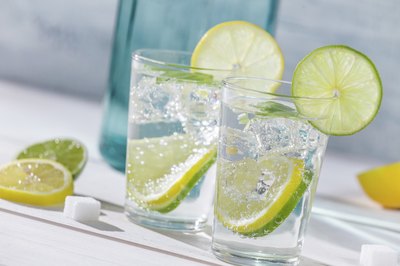 Two glasses of water with lime.