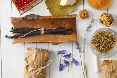 Natural personal care ingredients on a white table.