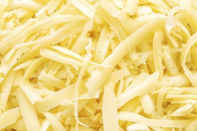 A close-up of shredded cheese.
